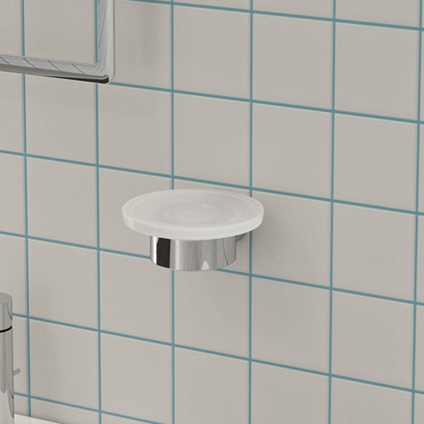 product lifestyle image of origins living pirenei chrome soap dish on white tiled wall